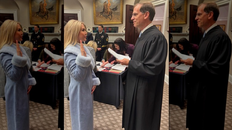 Karoline Leavitt at her swearing in ceremony wearing a blue coat