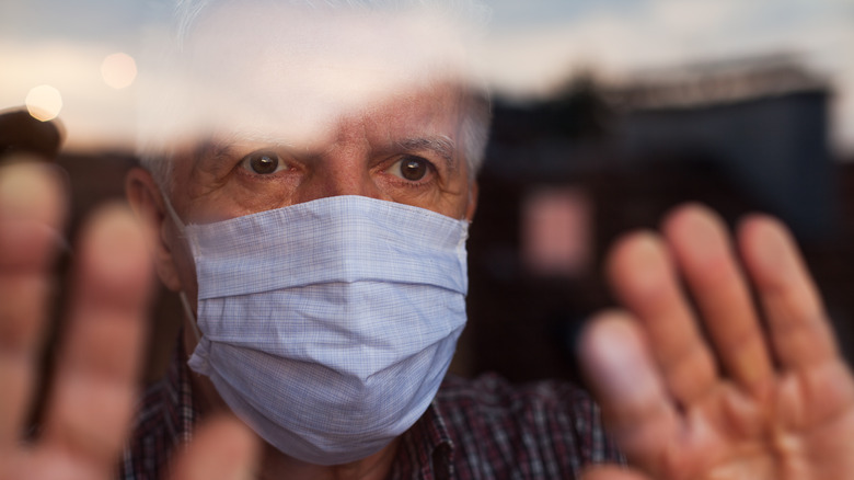 Older man wearing face mask