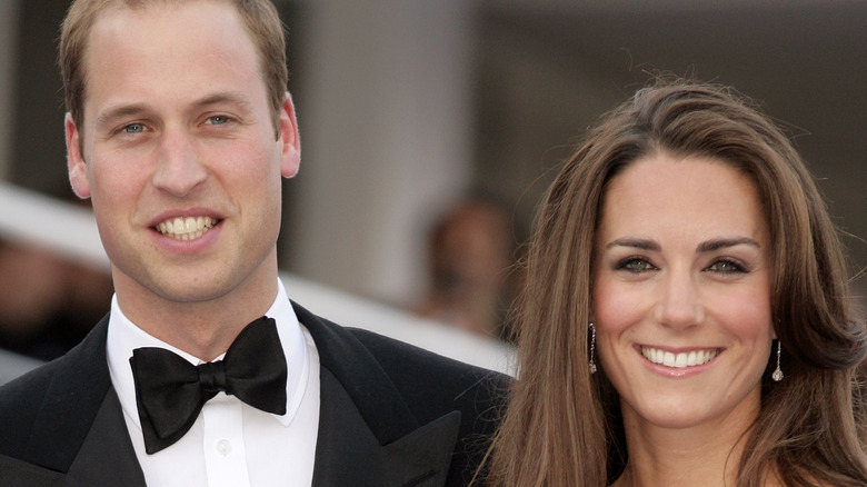 Prince William and Kate Middleton pose for a photo 