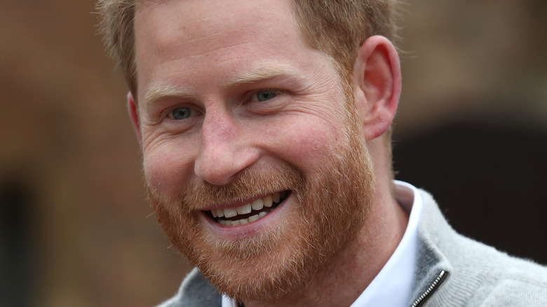 Prince Harry smiling at an event