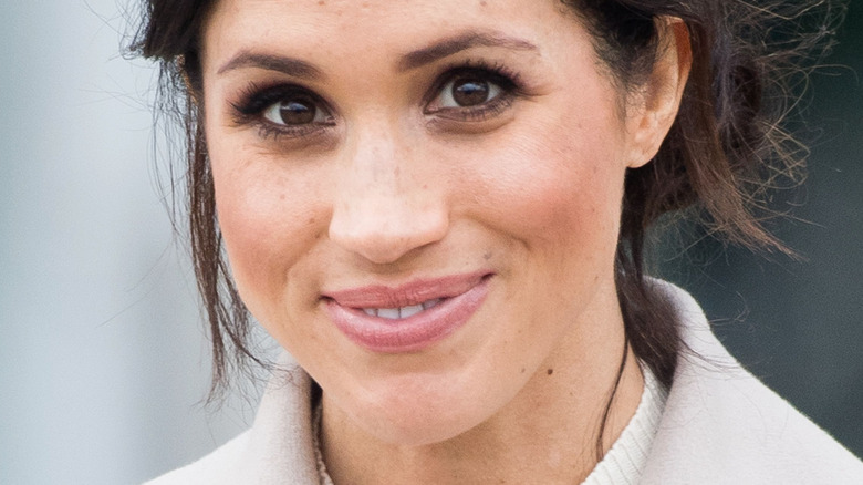 Meghan Markle smiling close up