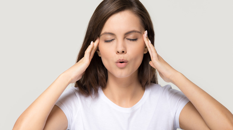 Woman feeling dizzy