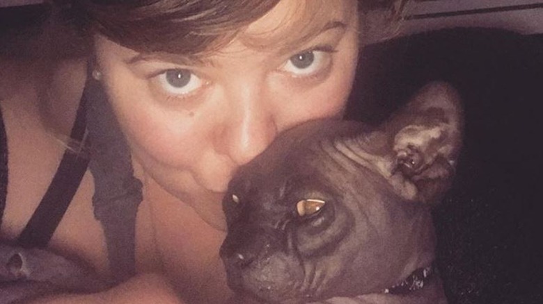 Madylin Sweeten with a cat