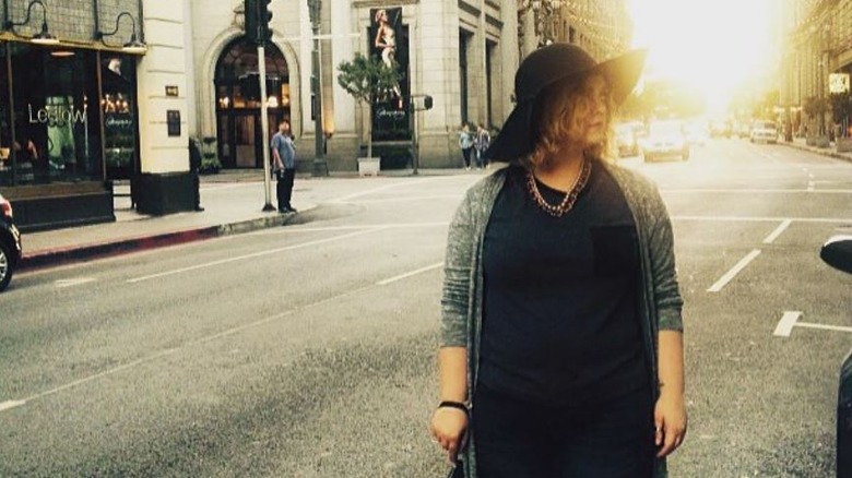 Madylin Sweeten standing in street