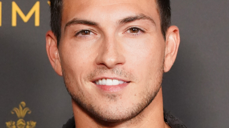 Robert Scott Wilson smiles for the camera 