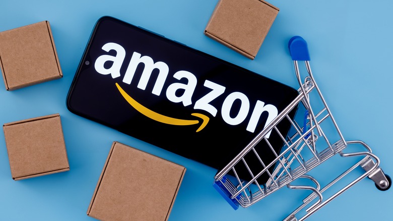 Amazon logo on phone in a shopping cart