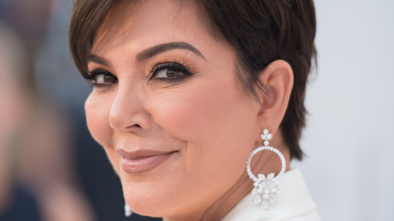 Kris Jenner looks over her shoulder