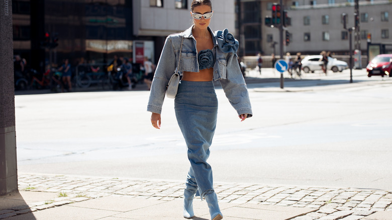 woman in denim maxi skirt