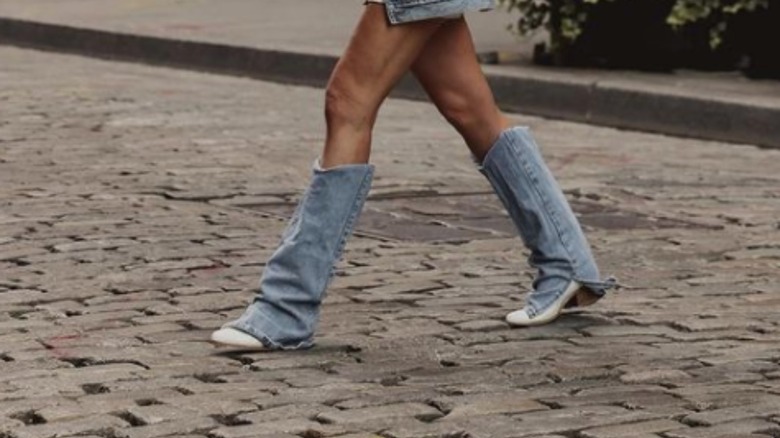 Woman wearing denim boots