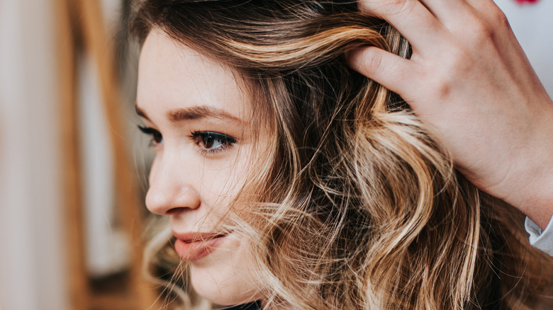 woman with hair highlights at the salon