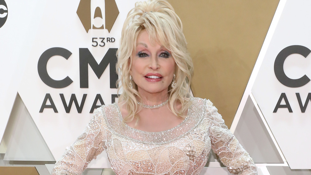 Dolly Parton posing on the red carpet