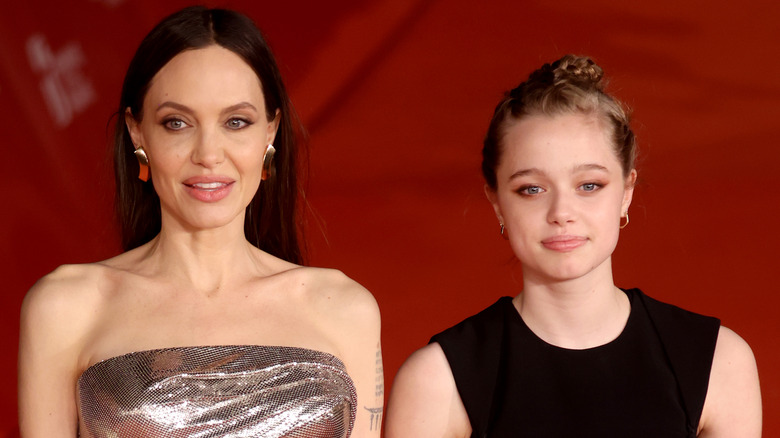 Shiloh Jolie-Pitt with her mom Angelina Jolie