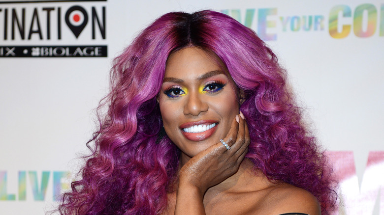Laverne Cox poses on the red carpet