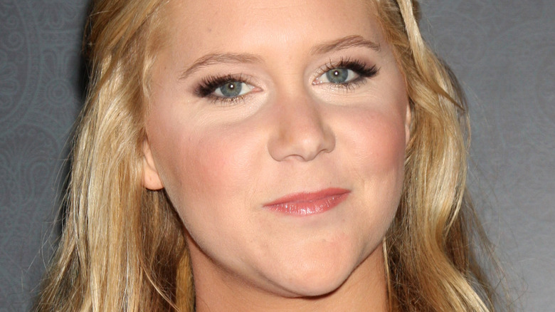 Amy Schumer tilting her head