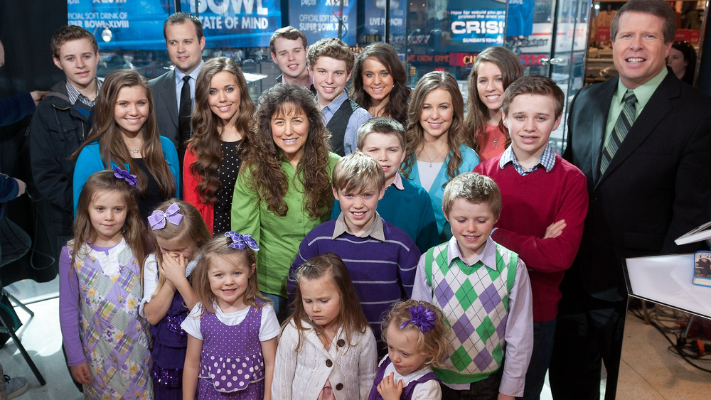 Duggar family photo on TV set