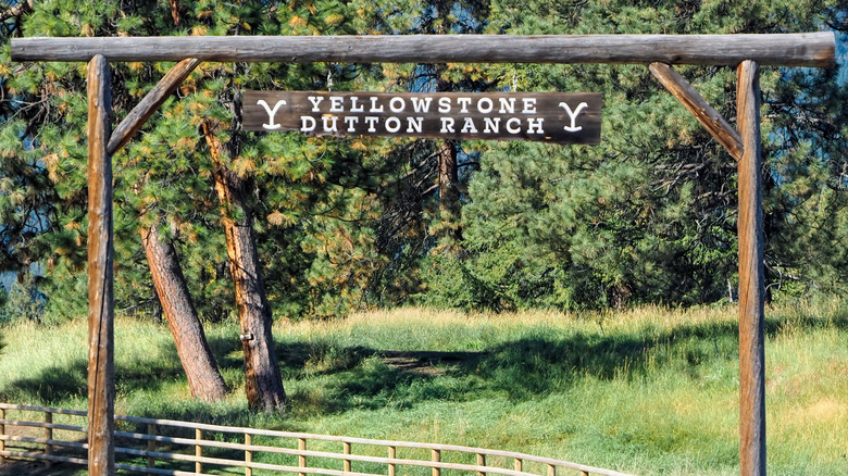A wooden archway with a "Yellowstone Dutton Ranch" sign