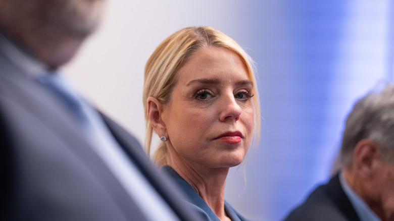 Pam Bondi photographed at a White House press briefing in February 2026
