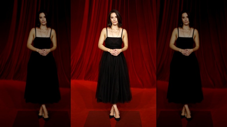 Ella Bleu Travolta arriving in a black tulle dress to the Academy Museum of Motion Pictures Gala