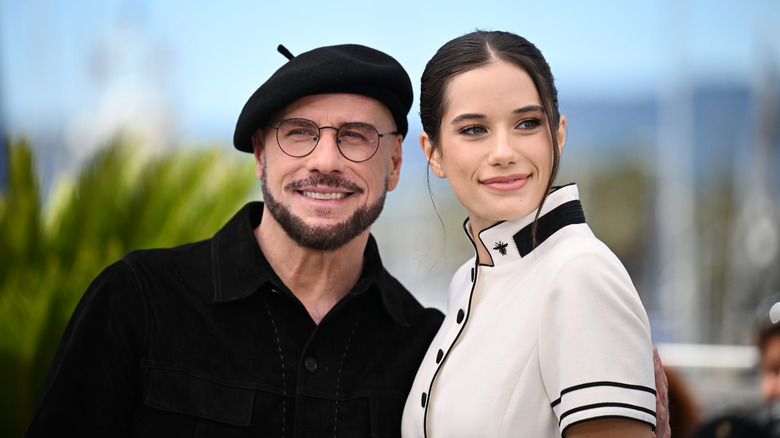 John and Ella Bleu Travolta posing for photos at the 2026 Cannes Film Festival