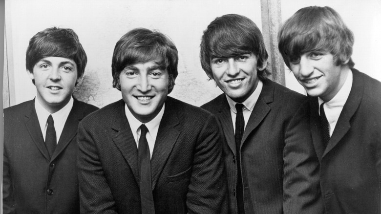 Rock and roll band "The Beatles" pose for a portrait in circa 1962. (L-R) Paul McCartney, John Lennon, George Harrison, Ringo Starr.