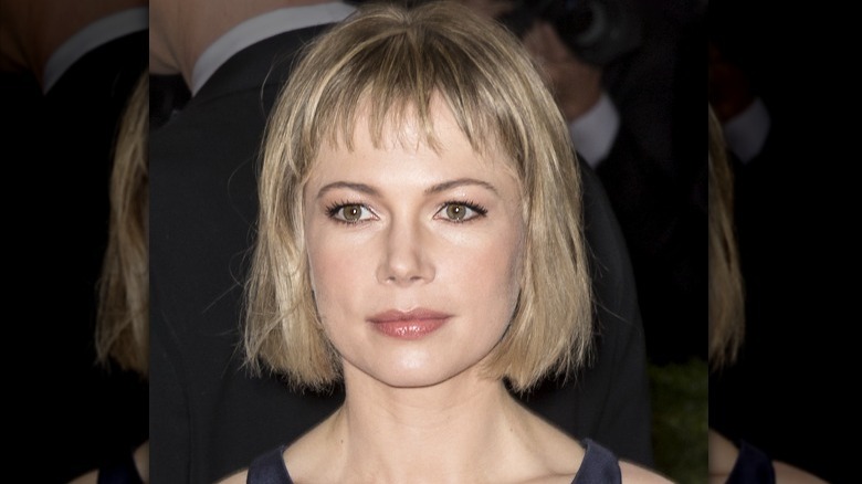 Michelle Williams with a bob haircut and bangs in 2016