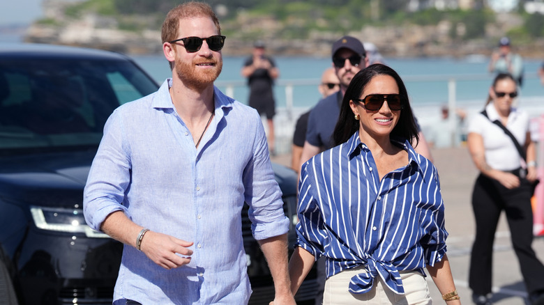 Prince Harry, Duke of Sussex and Meghan, Duchess of Sussex arrive to meet volunteer first responders from Bondi Surf Bathers' Life Saving Club, during a visit to Bondi Beach, on day four of the royal trip to Australia on April 17, 2026 in Sydney, Australia