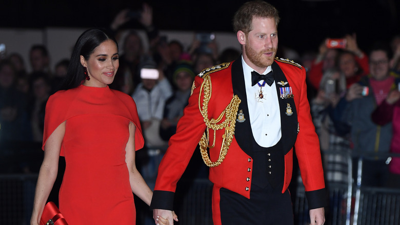 The Duke of Sussex, Captain General, Royal Marines, accompanied by The Duchess of Sussex attend the Mountbatten Festival of Music at the Royal Albert Hall on Saturday 7th March 2020.