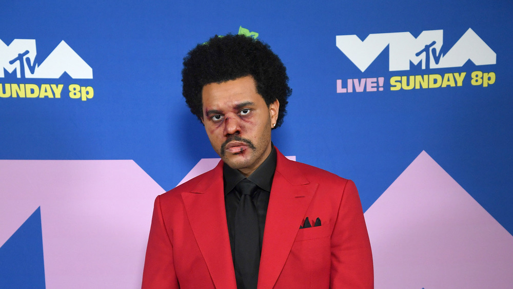 Why The Weeknd Wore Face Bandages - The Weeknd's Bruises, Explained