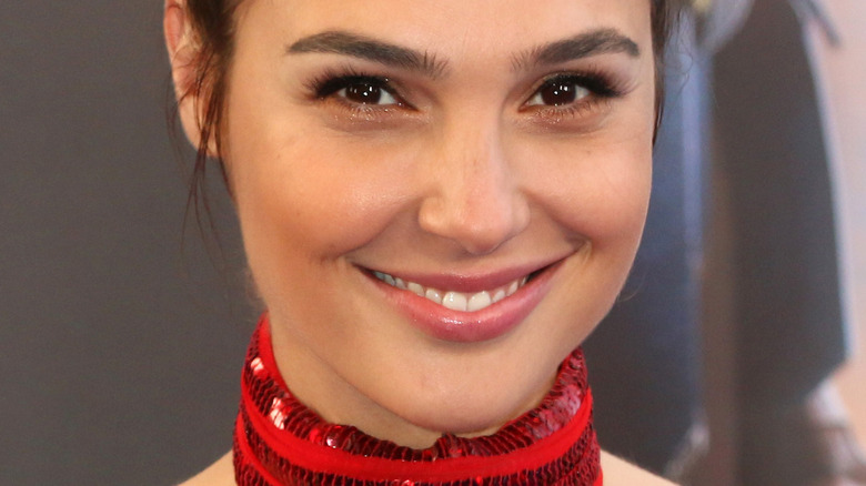 Gal Gadot smiling for cameras