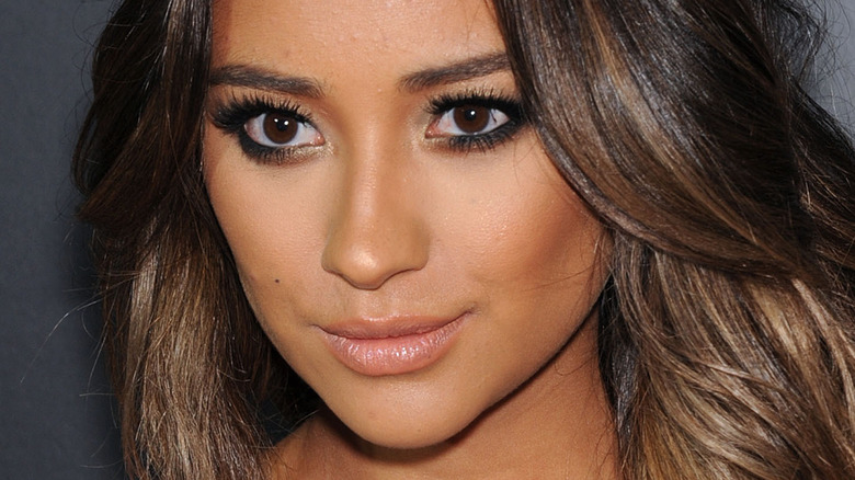 Shay Mitchell smizing