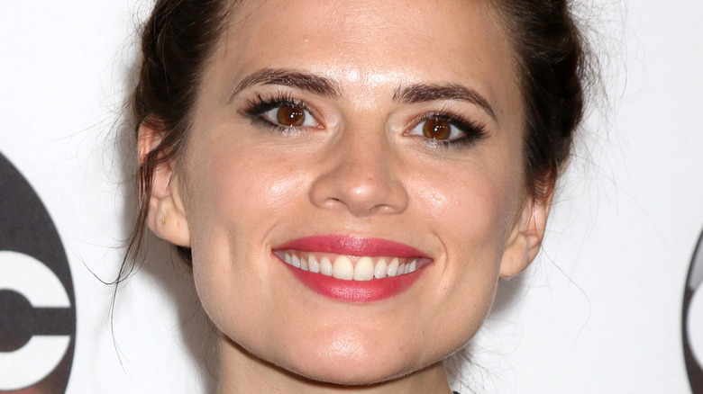 Hayley Atwell smiling for the camera at an event