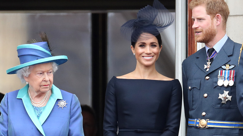 Queen Elizabeth, Meghan Markle, and Prince Harry