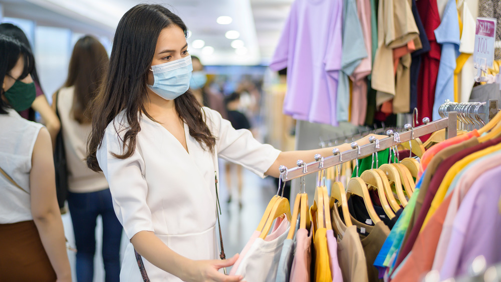 Woman shopping at the mall for clothing