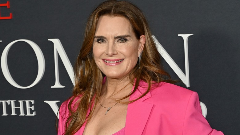 Brooke Shields in a pink suit on the red carpet