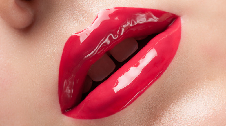 red glass lips with super shiny and super smooth finish