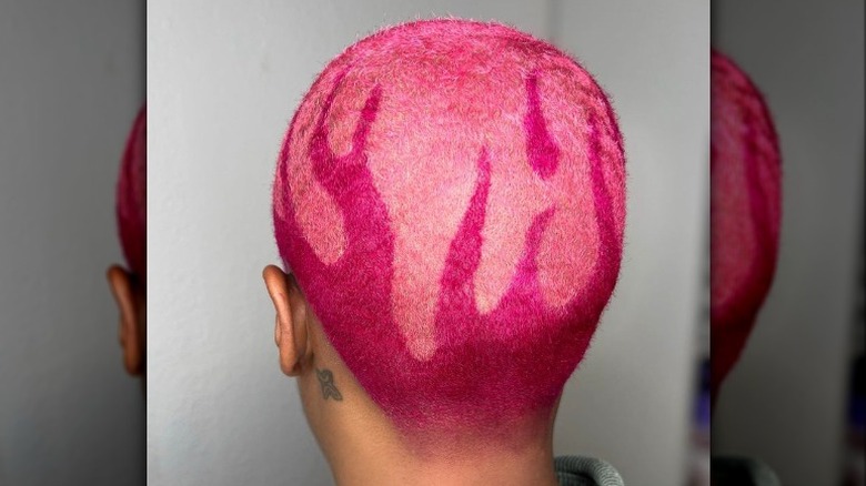 Buzzed hair with pink flame design