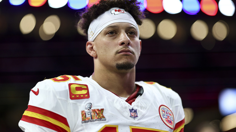 Patrick Mahomes in football uniform wearing headband