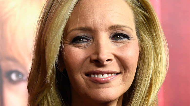 Lisa Kudrow smiles at an event