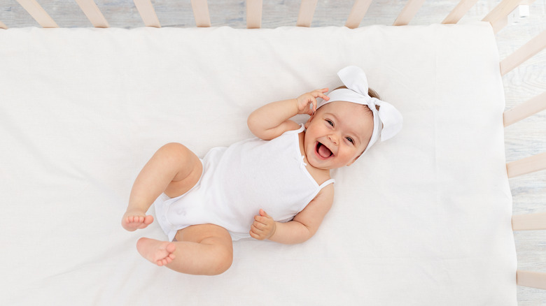 baby girl in crib