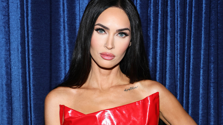 Megan Fox poses on the red carpet