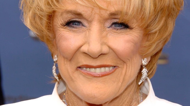 Jeanne Cooper smiling diamond earrings