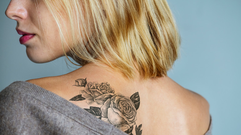 Woman with flower tattoo