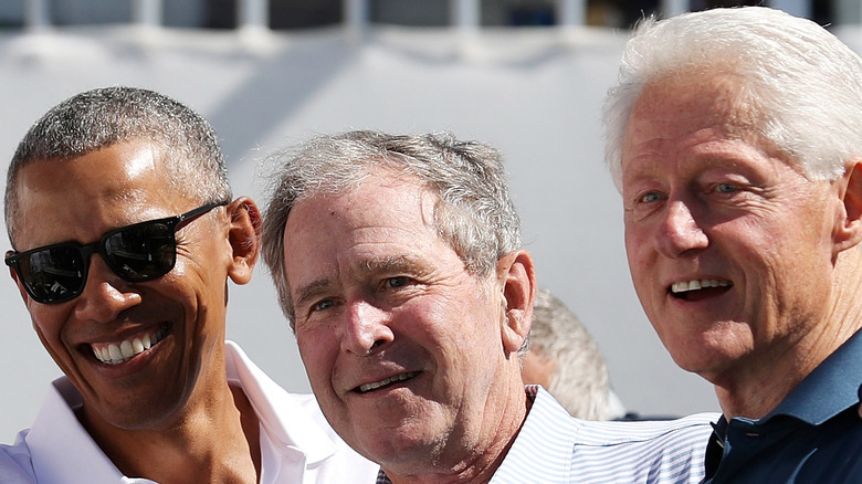 Barack Obama, George W. Bush, and Bill Clinton posing for picture