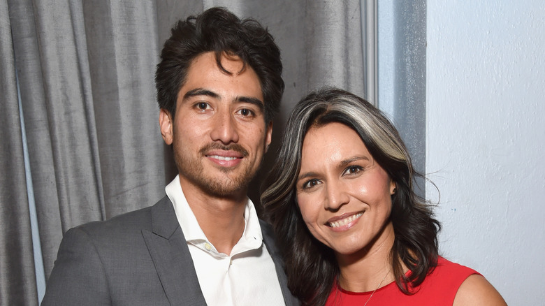 Tulsi Gabbard smiling with her husband Abraham Williams