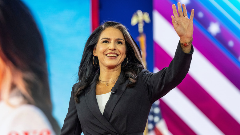 Tulsi Gabbard waving at the audience