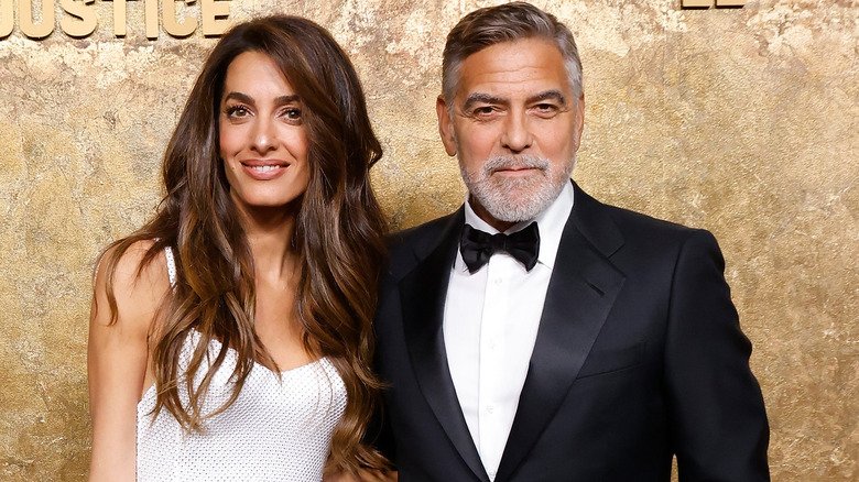 George Clooney and Amal Clooney smiling