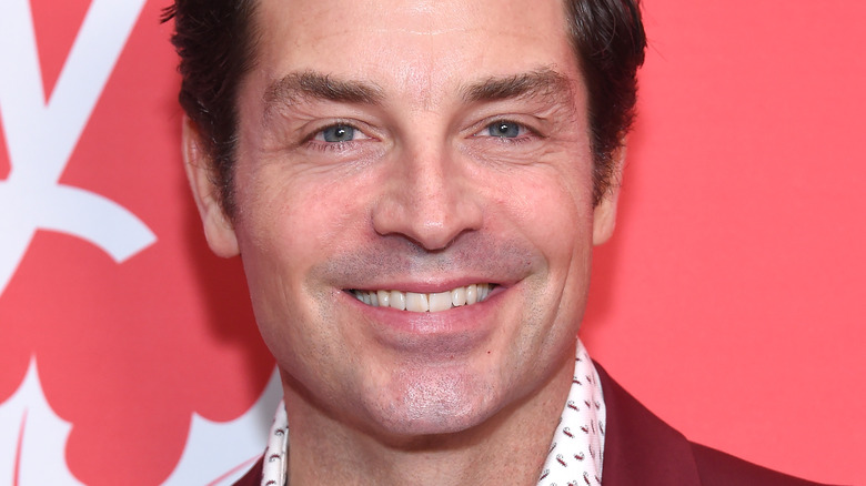 Brennan Elliott smiling at event