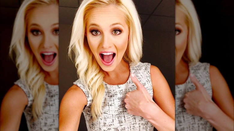 Tomi Lahren gives a thumbs up in a selfie in 2015