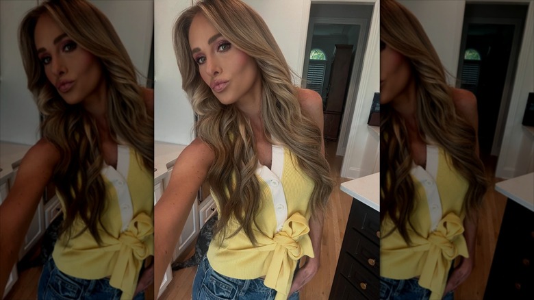 Tomi Lahren takes a selfie at home.