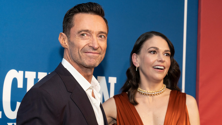 Hugh Jackman and Sutton Foster posing for photos